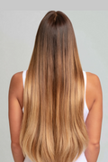 MOFRA Ombre clip-in hair extensions, back view, dark roots to blonde ombre, light grey studio background